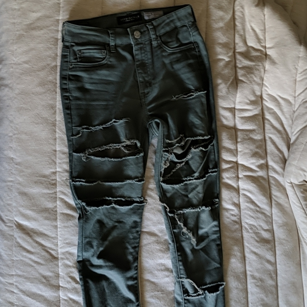 Green ripped jeans